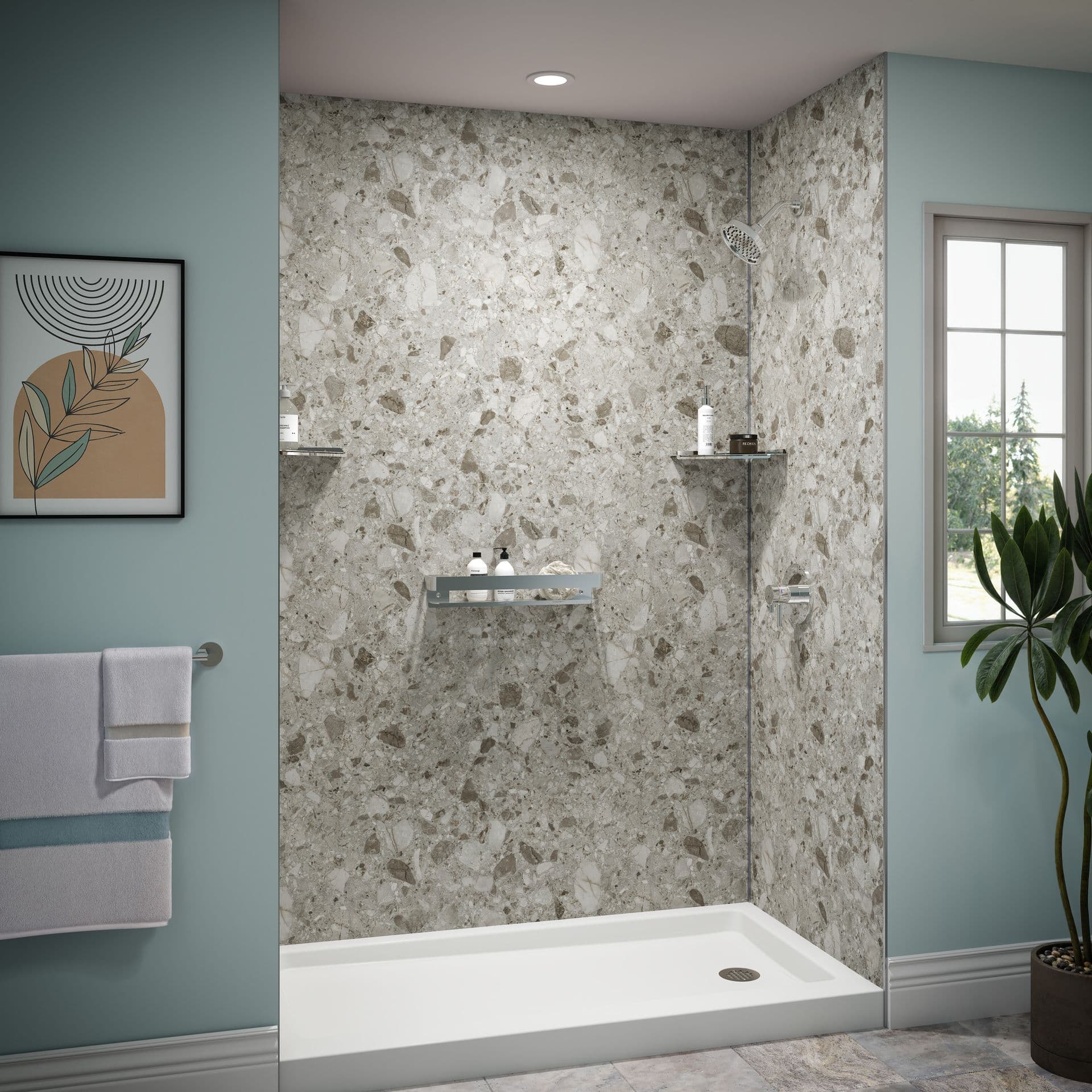 A teal blue bathroom with a gray stone textured walk-in shower.